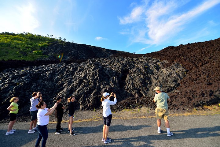 Group walking across a lava field