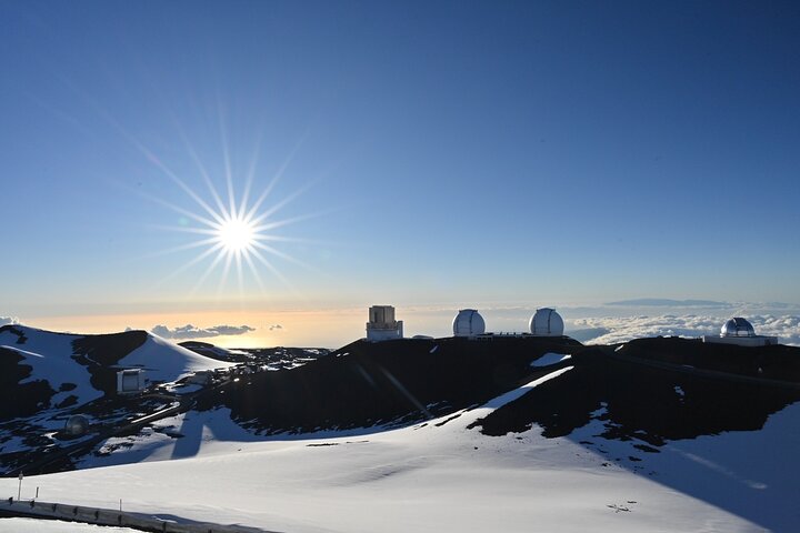 Telescope domes on the summit at sunrise